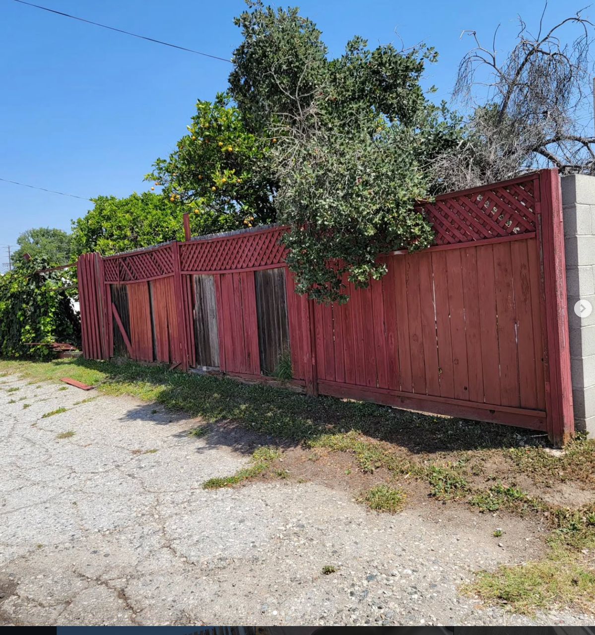 Wood Fence to Block Wall — before